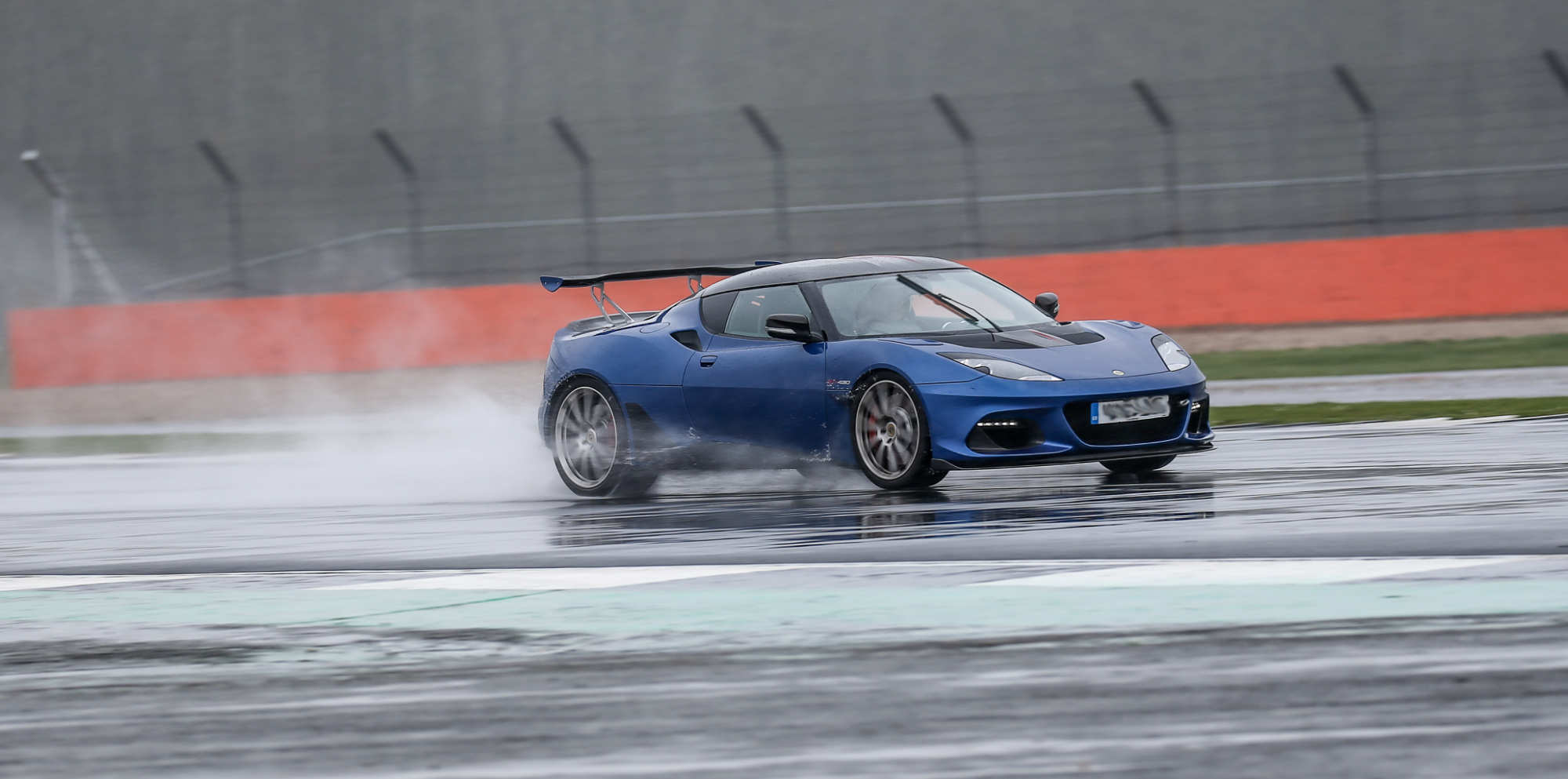 Blue Lotus On Wet Track At Silverstone